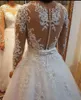 2020 Sheer Suknie ślubne Długie Rękawy Illusion Lace Aplikacje Suknie Ślubne Odpinany pociąg Plaża A-Line Wedding Dress de Noiva