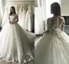 2020 New Luxury Ball Gown Wedding Dresses Jewel Neck Lace Appliques Long Sleeves Sheer Button Back Tulle Court Train Formal Bridal Gowns