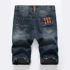 2017 mannen mode broek jongens jeans heren knop witte print randen slanke jeans gratis schip 9003777