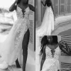 Sexig Spaghetti Beach Bröllopsklänningar 2019 Modest Lace Floral Fairy Tulle Backless Bridal Gowns Vintage Bohemian Country Wedding Dress