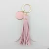 Unika personliga monograms -blanker Emaljskivläder Tassel Keychain Inledande graverade runda lädernyckelkedjor för väskbil KE8324235