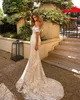 Sexy Spaghetti Mermaid Wedding Dresses Off Shoulder Covered Buttons Lace Applique Sweep Train Bridal Gowns Vestidos De Noiva
