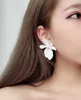 Hot Style Daisy pétalos pendiente personalidad femenina exagerada estilo largo colgante estilo coreano joker oreja anillo pendientes moda clásica delica