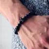 Black Skull Strands Mężczyźni Titanium Stal Bransoletka 8mm Naturalne Onyx Kamień Koraliki Urok Biżuteria Moda Prezent Walentynki Wakacje Boże Narodzenie