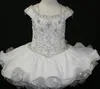 Den lilla flickan bär en klädsel på axlarna ärmar Pageant -klänningen Little Rosie SR206 Anpassad klänning2368528