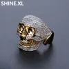 Anillo de Hip Hop Cobre Chapado en oro Iced Out Micro Paved CZ Stone Skull Ring para hombres y mujeres