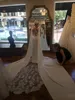 Robes de mariée en dentelle élégante longue traîne sexy dos transparent sans manches robes de mariée saoudienne arabe simple robe de mariée d'été sur mesure