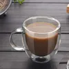 Tazza da caffè a doppio strato resistente al calore con manico Tazza da caffè ad alto borosilicato trasparente Innovativa tazza per fiori