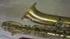 新しい到着ブランドBaritone Brass Tube Saxophoneユニークなビンテージ銅の表面Eケースが付いている平らな楽器はカスタマイズできますロゴ