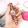 Dames de luxe robe Quartz diamant alliage cadeau montres pour femmes tendance de la personnalité de la mode pour exécuter la montre en acier inoxydable moulin à vent