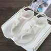 Оптовая Женская пластиковая Зорис Бич Jelly Thong Sandals Candy Color Flip-Plops Летние плоские дно Дневые Обувь Обувь Лодыжка Бабочка