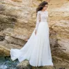 2020 Beach Bohemian Country A Line Abiti da sposa Illusion maniche lunghe Applicazioni in pizzo Maniche lunghe Bottone posteriore Sweep Train Abiti da sposa