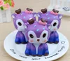 Groothandel Galaxy Cute Kawaii Cartoonoon 12 * 8.5cm herten crème geurige knijp squishy riem grappige gadgets anti stress nieuwigheid antistress speelgoed