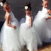 Robes de fille de fleur pour les mariages avec des appliques de cou transparent en dentelle Cupcake Pageant robe pour les filles longues robes de fête de mariage pour enfants