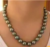 Collier de perles rondes de Tahiti des mers du sud noires et vertes de 10 à 11 mm Fermoir en or 14 carats de 18 pouces