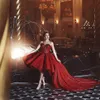 Saudi Fashion Sparkly Prodes Appliques Vネックノースリーブスパージーボールガウンパーティードレス魅力的なハイローセレブイブニングドレス