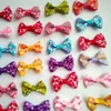 100pcs / parti 1.4inch baby husdjur hund hårklipp katt valp bågar liten bowknot husdjur grooming produkter mix färger hårbågar hund tillbehör