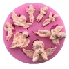 ケーキフォンダンチョコレートポリマー粘土型のための翼シリコンの金型と8つのキャビティ妖精の天使のベビーシリコーンの天使の天使