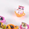 12 st Mindre Miniatyr Terrarier Fairy Garden Dekorativa harts Cat Figure Craft Presentprydnad Terrarium Tillbehör