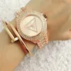 Marca de moda para mujer Chica estilo triángulo de cristal dial de acero banda de metal reloj de pulsera de cuarzo GS6831-1