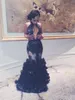 2018 African Mermaid Prom Dresses Black High Neck Keyhole Lace Applique Sequins Backless 3D Flowers Tiered Evening Dress Wear Party Gowns