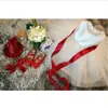 فستان أبيض للفتاة معمودية ملابس 1 سنة طفلة عيد ميلاد فستان أميرة الشريط الأحمر القوس عيد الميلاد الفساتين للبنات 321n