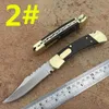 High-end 110 coltello automatico singola azione posteriore seghettato ottone + legno maniglia caccia natale lama del regalo 1pcs