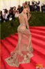 Abiti da sera con perline trasparenti Beyonce Met Ball Red Carpet Abiti da ballo per celebrità nude Vedere attraverso il vestito formale Sweep Train Backless HY948