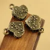 200 pcs heart shaped pendant charms antique bronze color with cookie good for DIY craft jewelry making