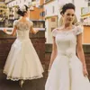 Abiti da sposa vintage stile anni '50 Illusion Neck Cap maniche Pizzo Tulle Lunghezza alla caviglia Abito da sposa corto economico con fiore fusciacca