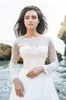 2020 Beach Bohemian Country A Line Abiti da sposa Illusion maniche lunghe Applicazioni in pizzo Maniche lunghe Bottone posteriore Sweep Train Abiti da sposa