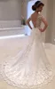 バックレスvネックショートスリーブパールズビーズウェディングドレスカスタムメイドのレース刺繍アップリケMermaid Bridal Gowns