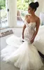 Mermaid Dresses Sexy Spaghetti Straps Tiered Tulle Lace Appliques Court Train Wedding Gowns Bridal Dress