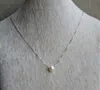 Un collier de perle 9 mm ivoire rond en eau douce perle 925 Collier de chaîne en argent sterling18inches3368272