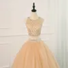 Bling Gold Ball Gown Prom Klänningar Juvel Neck Crystal Tulle Hollow Back Två bitar Billiga Designer Ruched Long Evening Formell Kappor Klänning