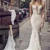 Lian Rokman Nyaste Charmiga Mermaid Bröllopsklänningar Bohemian Lace Applique Deep V Neck Backless Lace Appliques Custom Made Bridal Gowns