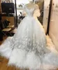 Gorgeous Feather Wedding Dresses 2018 Lace Appliques Sheer Short Sleeves Bridal Gowns Lace Up Back Sweep Train Saudi Arabic Wedding Vestidos