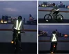 反射的な安全服の高い視認性昼と夜の調整可能な弾性ストリップベストジャケットサイクリング屋外を走る