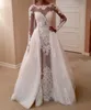Sexy Illusion Long Sleeves Wedding Dresses With Overskirts Lace Appliques Sweep Train Jewel Neck Bridal Gowns Zipper Back Wedding Guest