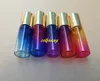 200PCS / Parti 5ml Gradient Rainbow Färgglas på flaska med stålrullflaska Essentiell olja Kosmetiska förpackningsflaskor C2201