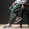 4 colori uomo streetwear hip hop pantaloni scozzesi casual pantaloni uomo donna moda pantaloni harem larghi pantaloni coppia pantaloni sportivi jogger