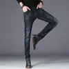 autumn men's jeans Korean version of the trend causal and self-cultivation stretch straight feet pants men