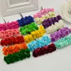 144pcs 1cm Billiga artificiella papper Blommor för bröllopsbil Fake rosor som används för dekoration godisbox DIY-krans handgjorda