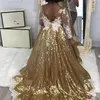 2019 Paillettes oro Ragazze di fiore Abiti per matrimoni V Indietro Appliques di pizzo bianco Maniche lunghe Principessa Lunghezza pavimento Abiti da spettacolo Bambini Prom