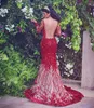 Saudi Arabia Glamorous 2018 Prom Dress Sheer Jewel Neck Sequins Beads Floral-Applique Evening Dress Luxury Mermaid Party Dress Robes De Soir