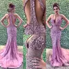 Luxrious Rhinestone Mermaid Prom Dress Diepe V-hals Pailletten Krème Crystal Cutaway Partyjurken Sexy Mode Avondjurk Dubai Jurken