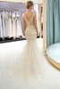 New Designer 2019 Sexy Gold Gray Mermaid Prom Dresses Beads Crystals Bling Bling V Back Sheer Neck Tiered Tulle Floor Length Evening Gowns