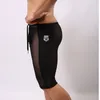 Nouveau Design vendu couleurs mâle voir à travers des slips Boxer Transparent sous-vêtements élastiques Shorts maille protection entrejambe cinq pantalons