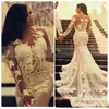 Arabskie Syrenki Koronki Suknie Ślubne Z Długim Przezroczystym Rękawem Załoga Neck Aplika Vintage Informal Wedding Party Dress Darmowa Wysyłka