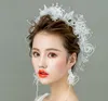 Braut-Kopfbedeckung, Sen-Fee, weiße Schönheit, Feder-Feder-Creolen-Ohrring, Hochzeits-Gaze-Schmuck.